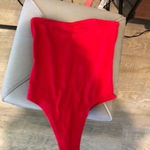 red strapless body suit